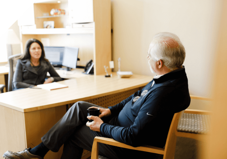 Careers Row2 Man and a woman sitting at a desk