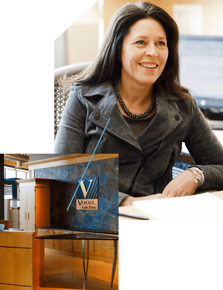Vogel Office Image Woman sitting at desk at the vogel office