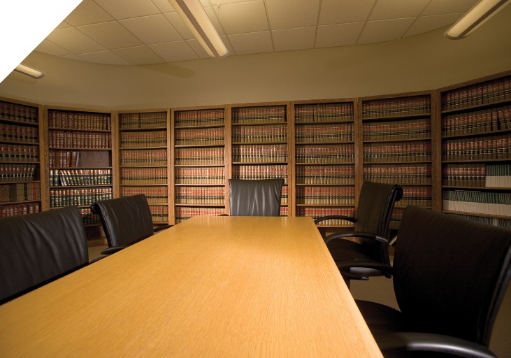 Mask Group 16 conference room with large table and chairs