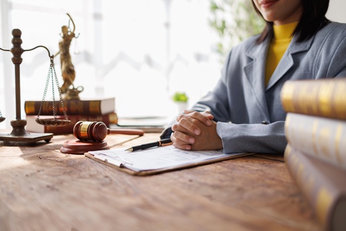 Lawyers,consultation,and,conference,discussing,legal,matters,at,a,desk