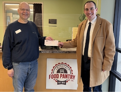 Two men at the Food Pantry office